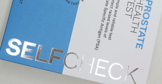 SELFCHECK Prostate Health self-test kit coloured powder blue and white with vertical silver SELFCHECK logo on side of pack