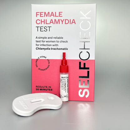 SELFCHECK chlamydia test kit contents showing box, extraction buffer bottle and test cassette